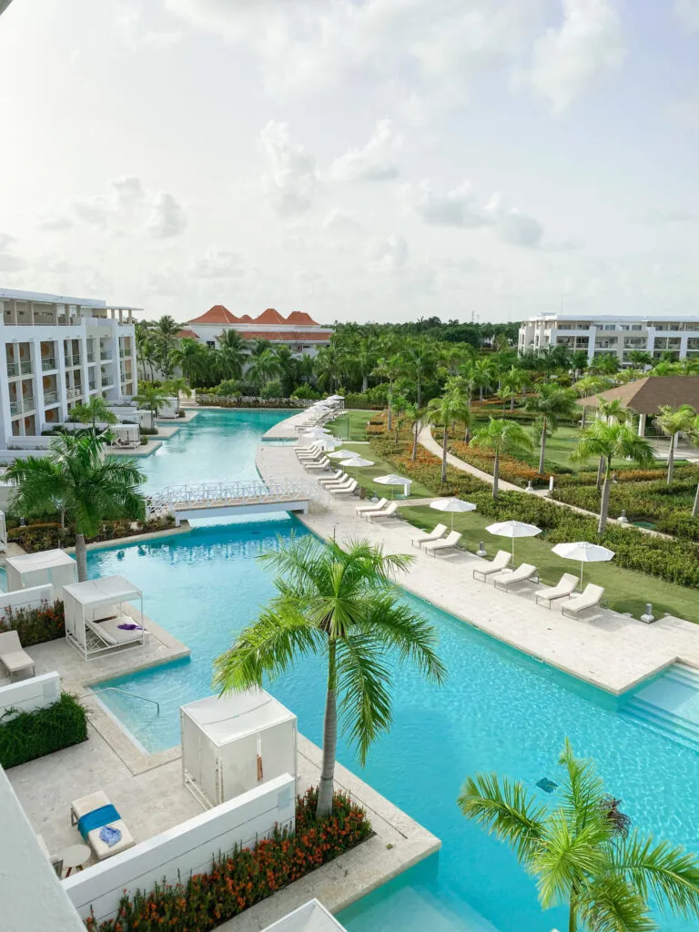 Paradisus Grand Cana — the resort's winding pools, white cabanas, and palm-lined walkways from above